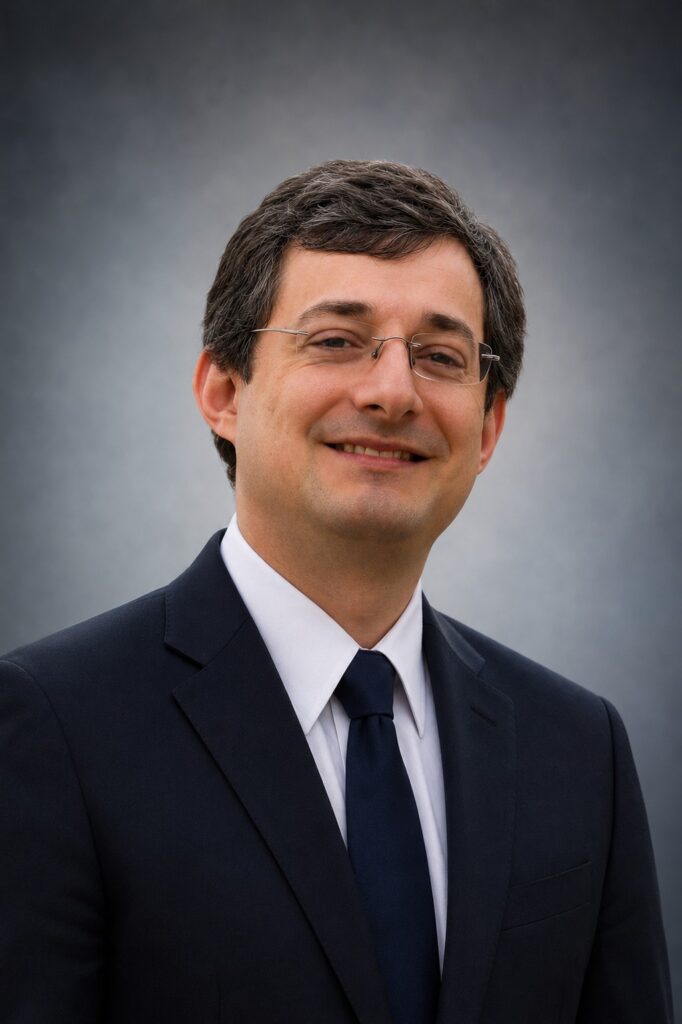 Dr. Adam Schechner