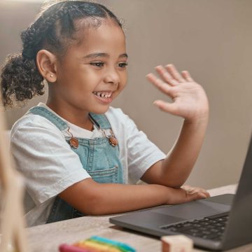 Small child using a laptop